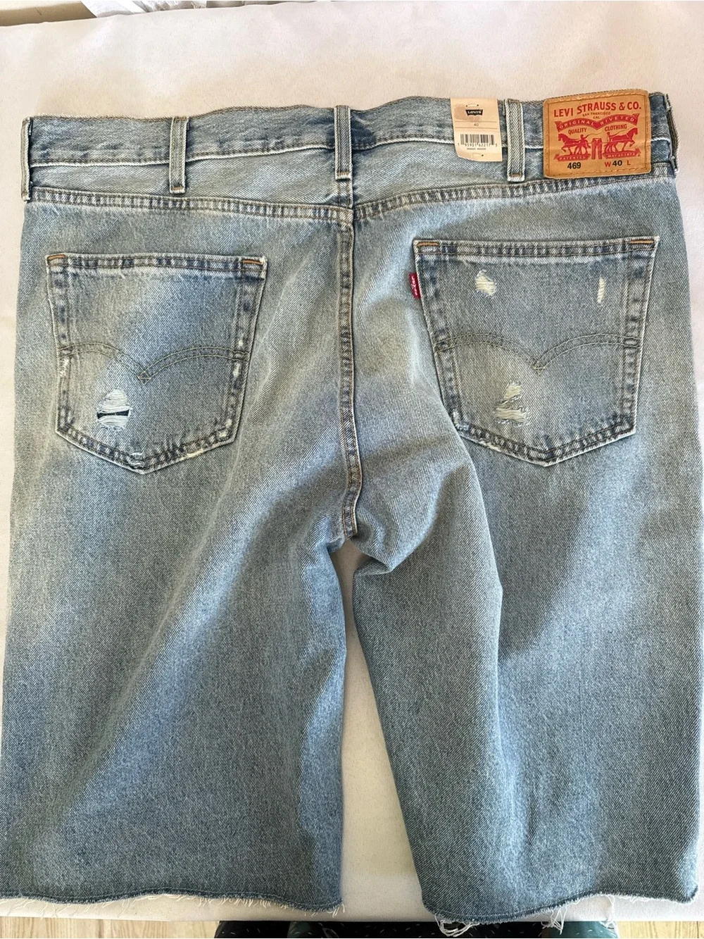 Sz 40 Men's Levis 469 loose shorts Light Blue Distressed Denim (76)